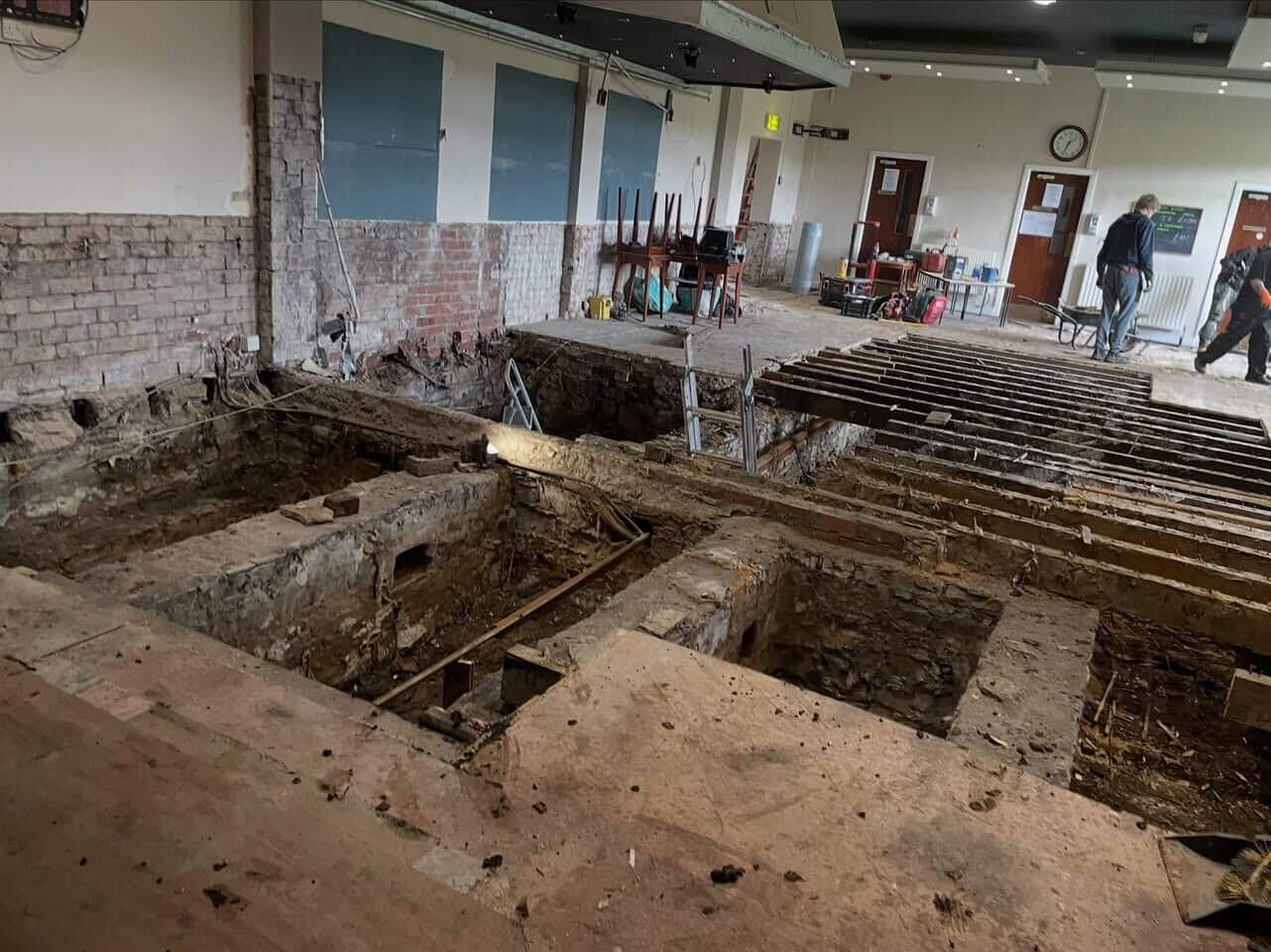 Dry rot repair to the function room floor at Darwen Bowling Club. Rotten Timber