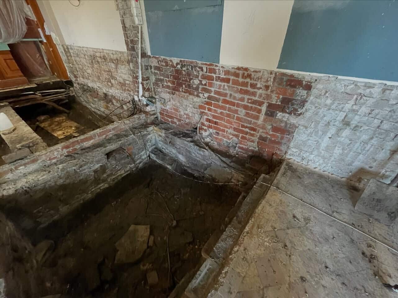 Dry rot repair to the function room floor at Darwen Bowling Club. Dry Rot