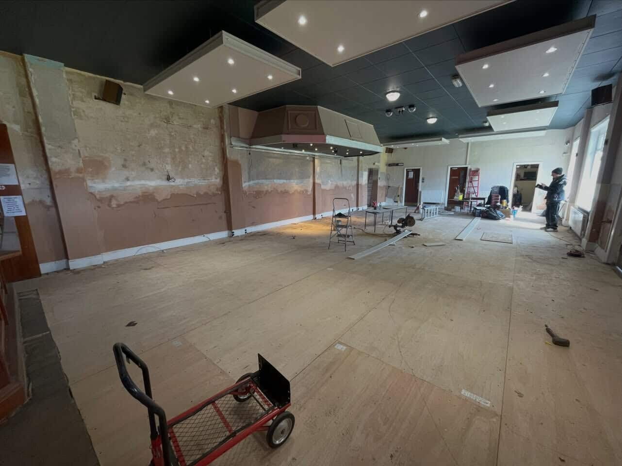 Dry rot repair to the function room floor at Darwen Bowling Club. Pre treated boards