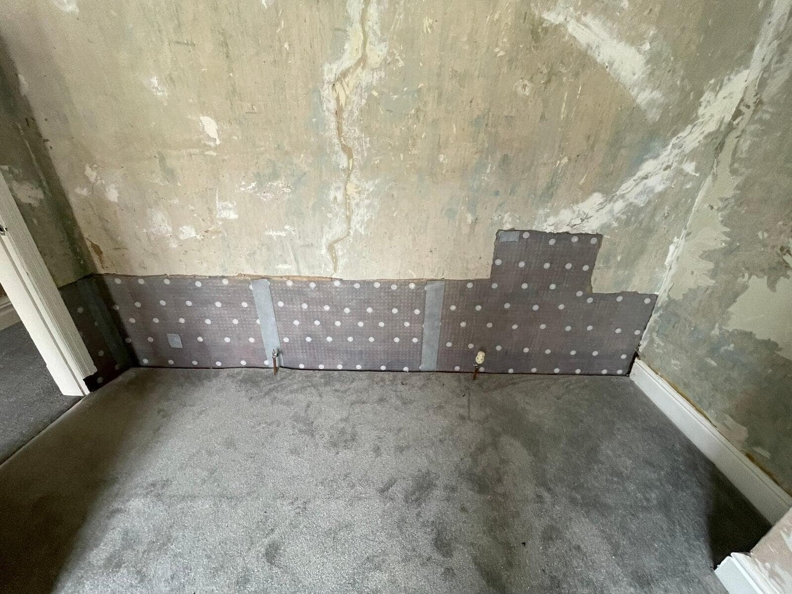Damp-proof membrane fitted to a ground-floor wall, Great Harwood